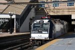 Inbound commuter makes its station stop